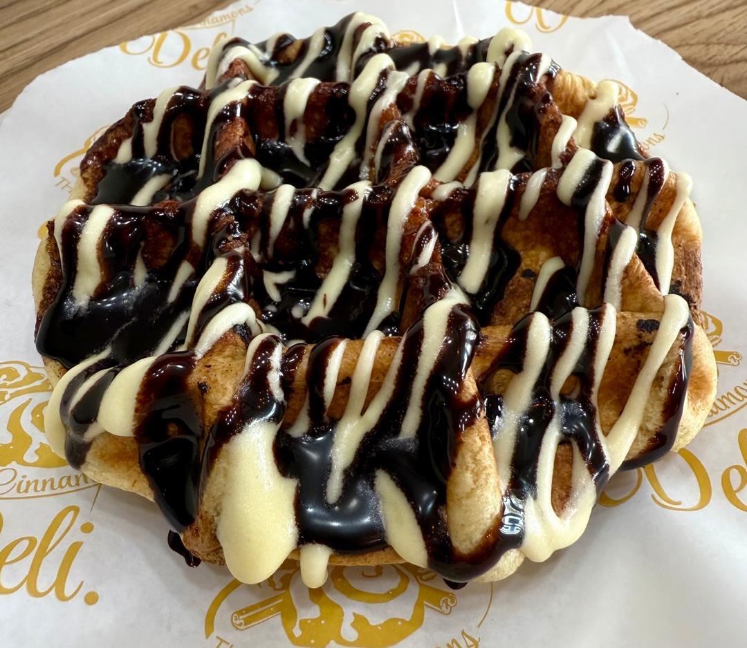Cinnaffle drizzled with chocolate and frosting