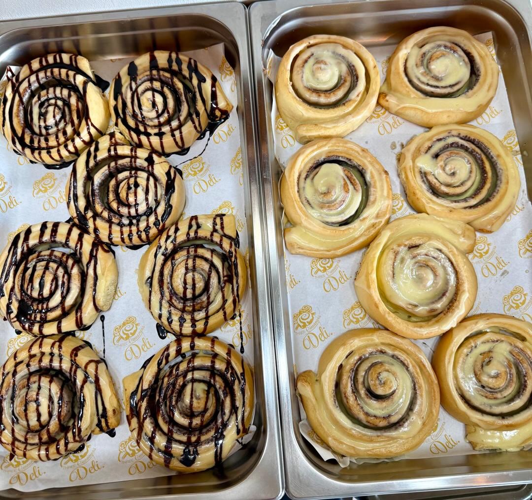 Trays of chocolate and classic cinnamon rolls
